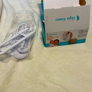 Child safety cabinet locks and furniture straps